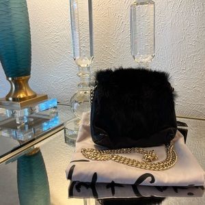 Foley + Corinna Fur/Leather purse with gold chain.